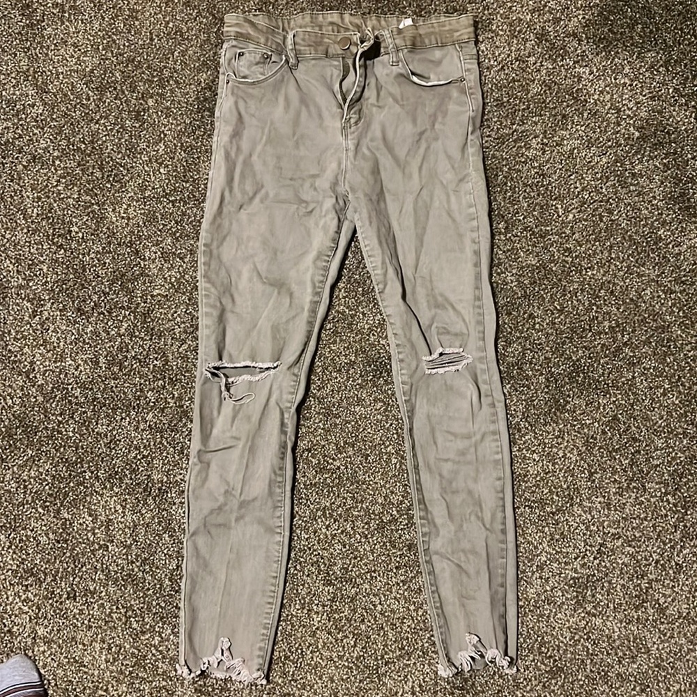 grayish-army green skinny jeans